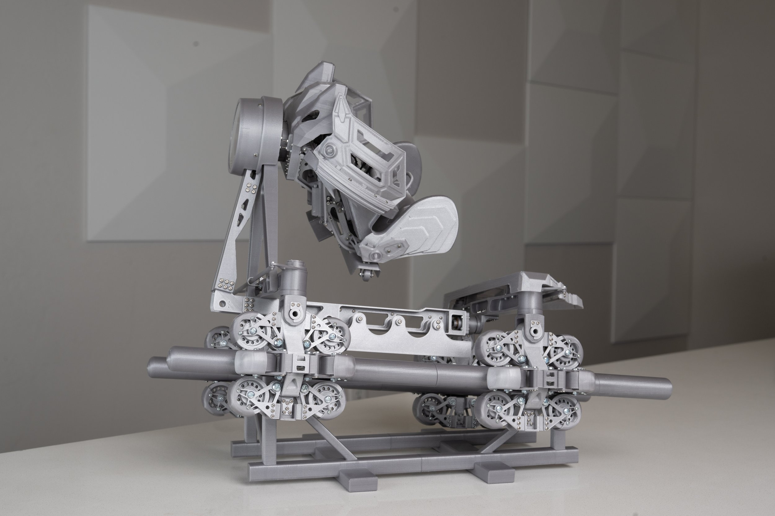 An image of a 3D printed model of the S&S AXIS coaster.