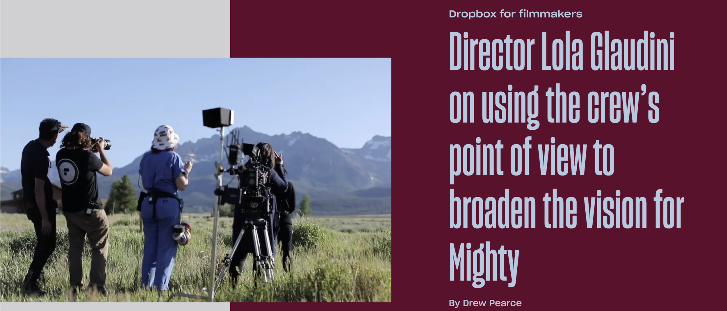 Filmmakers setting up equipment outdoors with snow-capped mountains in the background. Behind the scenes on short film "Mighty" by Lola Glaudini.