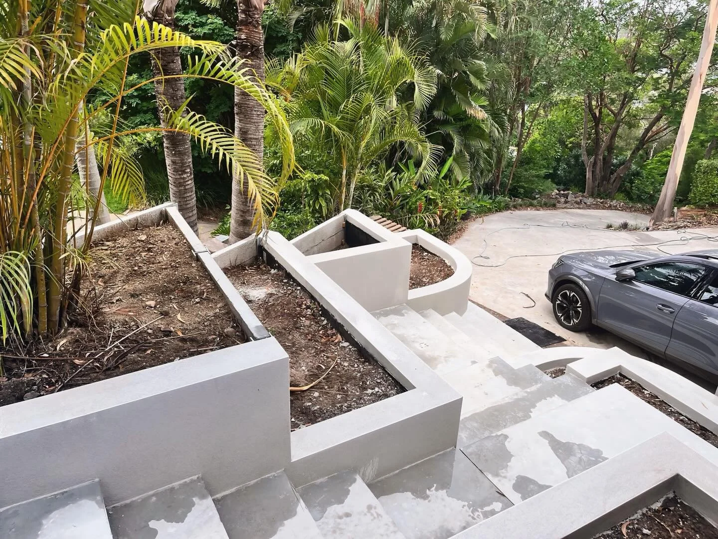 Curved walls finished in acrylic render as part of a recent landscaping project.

At Rendering Solutions Brisbane, we don&rsquo;t just render houses &mdash; we work across landscaping, feature walls, and custom projects to bring clean, durable finish