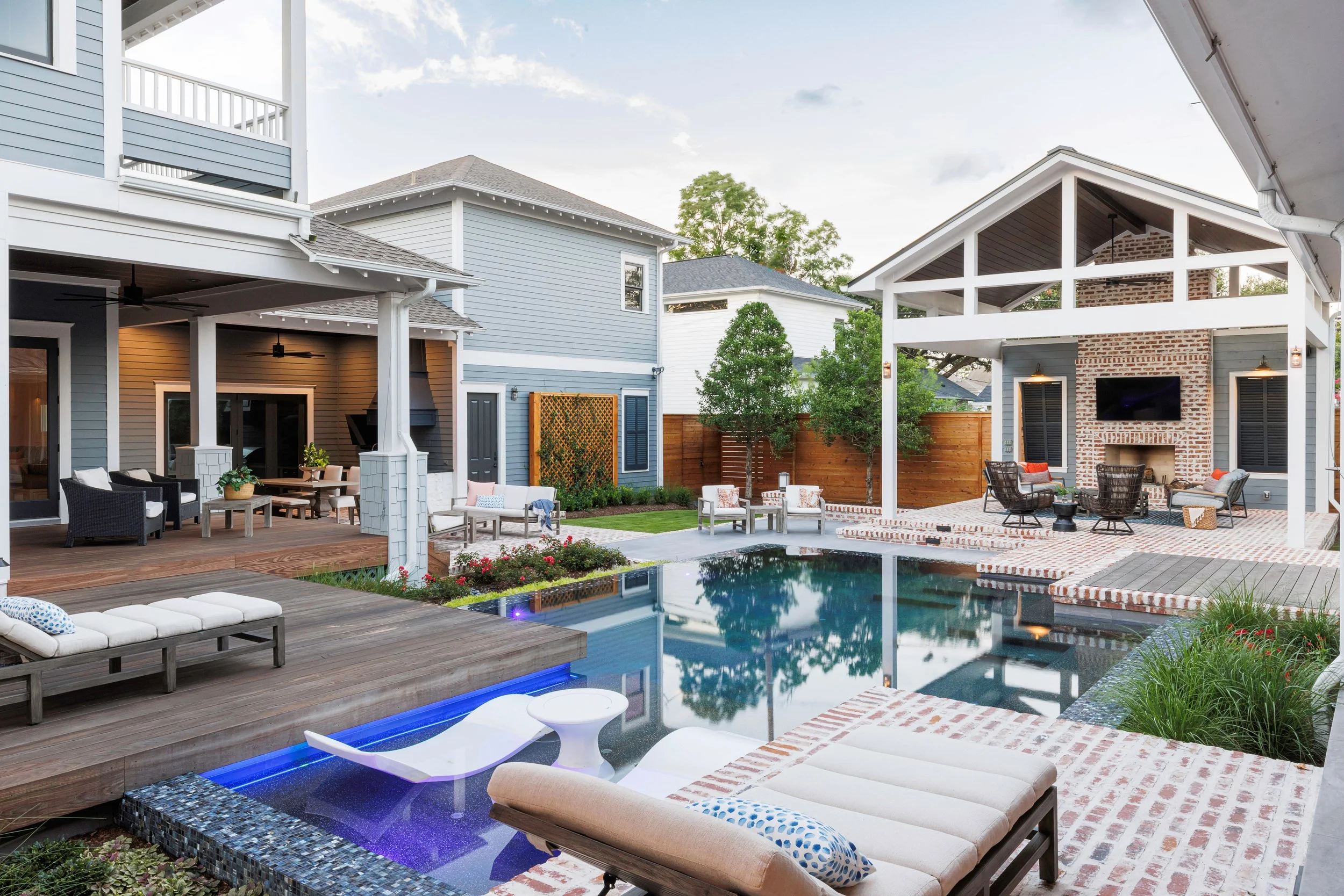 Outdoor Living Space looking toward Outdoor Kitchen and Dining.jpg