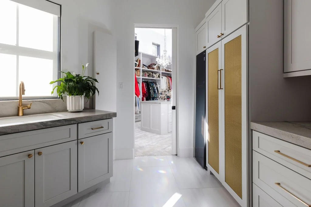 Exquisitely Chic 42 - Primary Closet Laundry Room.jpg