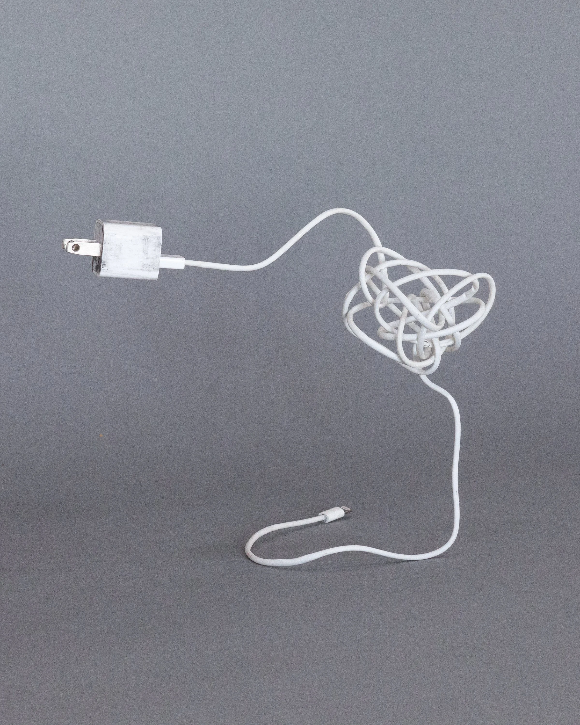 Mauro C. Martinez_Plug,2023_Cables and power plug_17.78cmx17.78cmx15.24cm.jpg