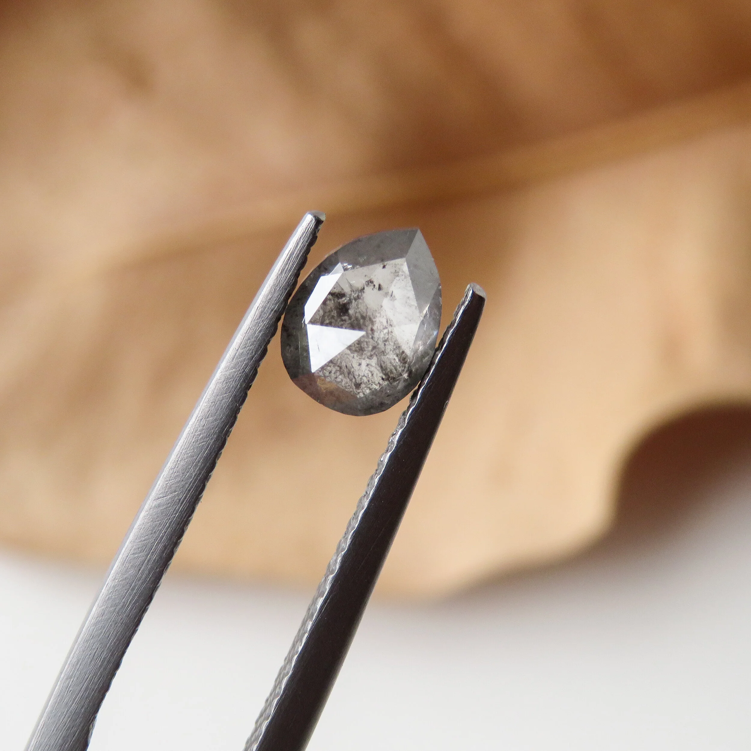 rose cut pear shaped salt and pepper diamond