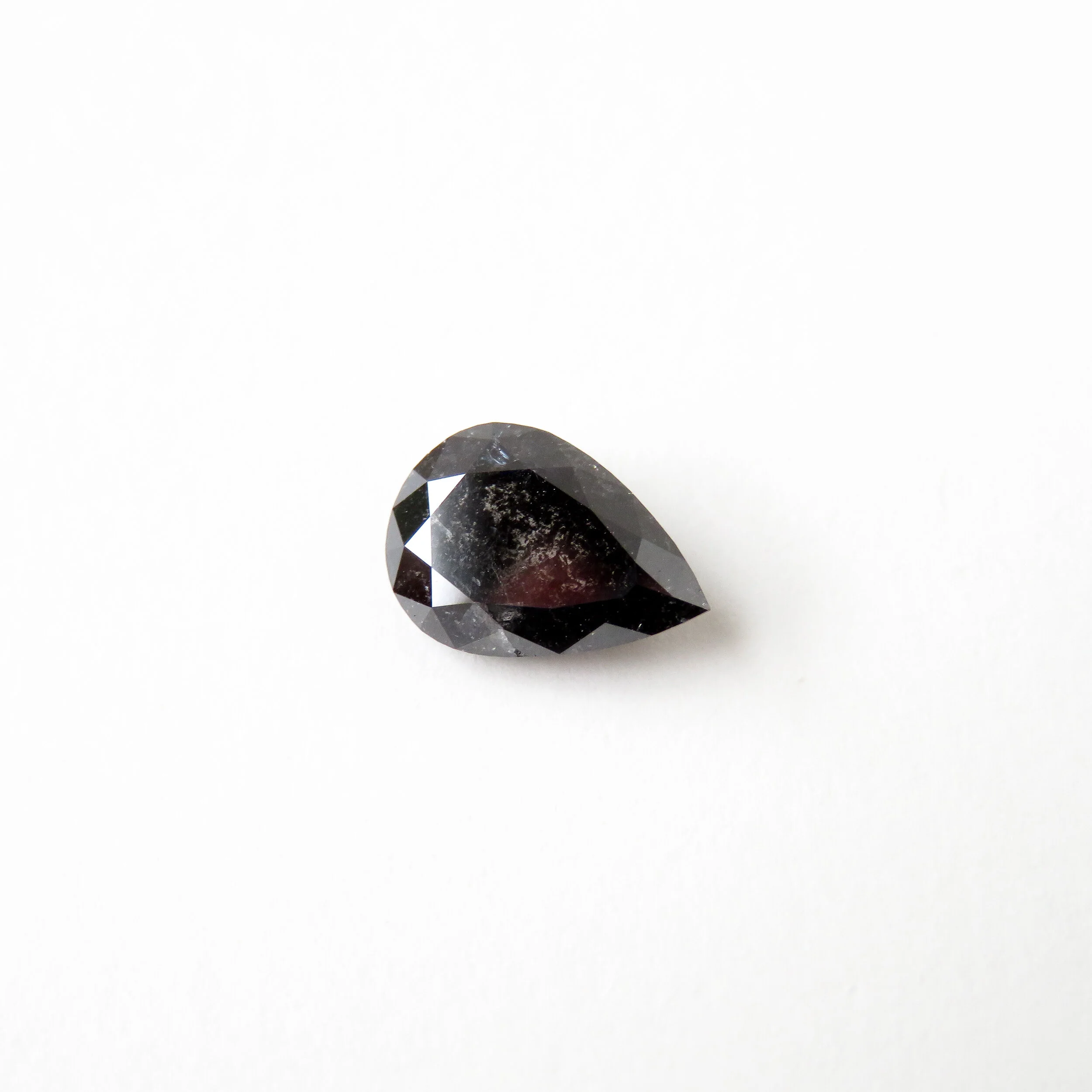 brilliant cut pear shape salt and pepper dark grey diamond