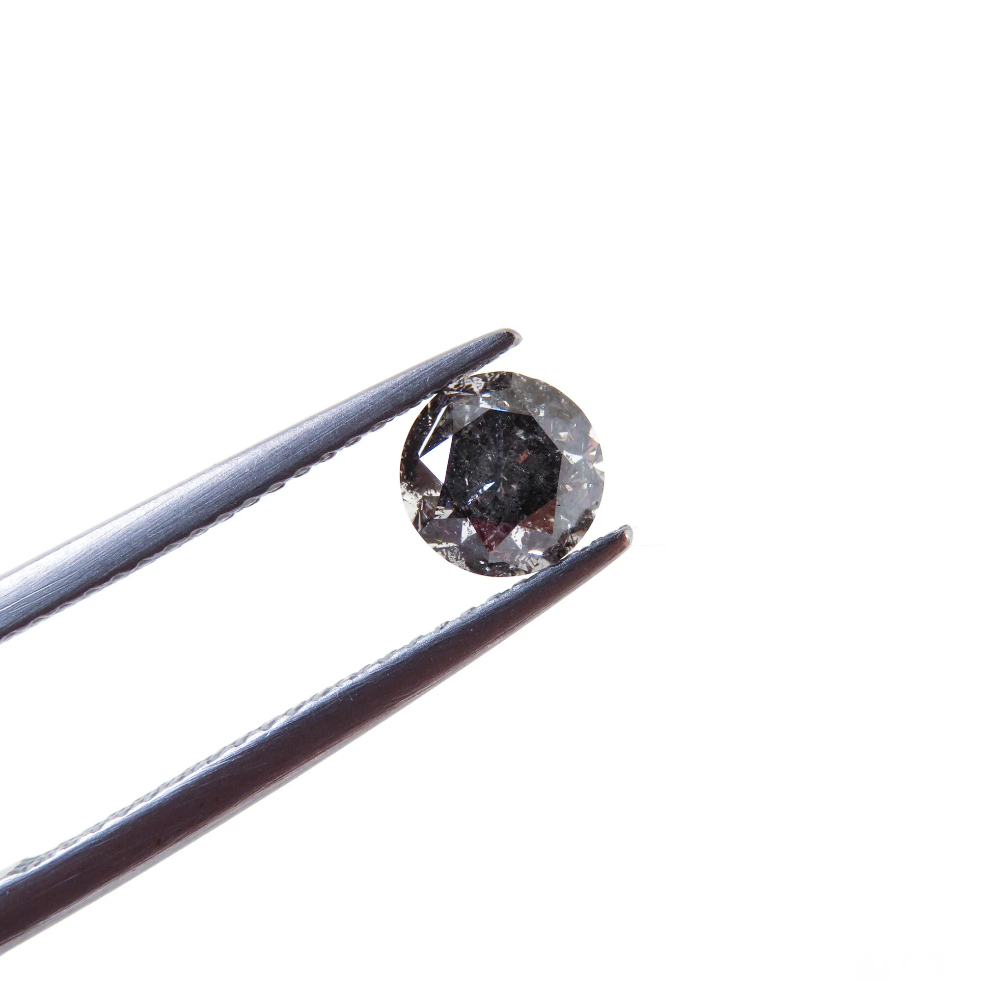 round brilliant cut salt and pepper diamond