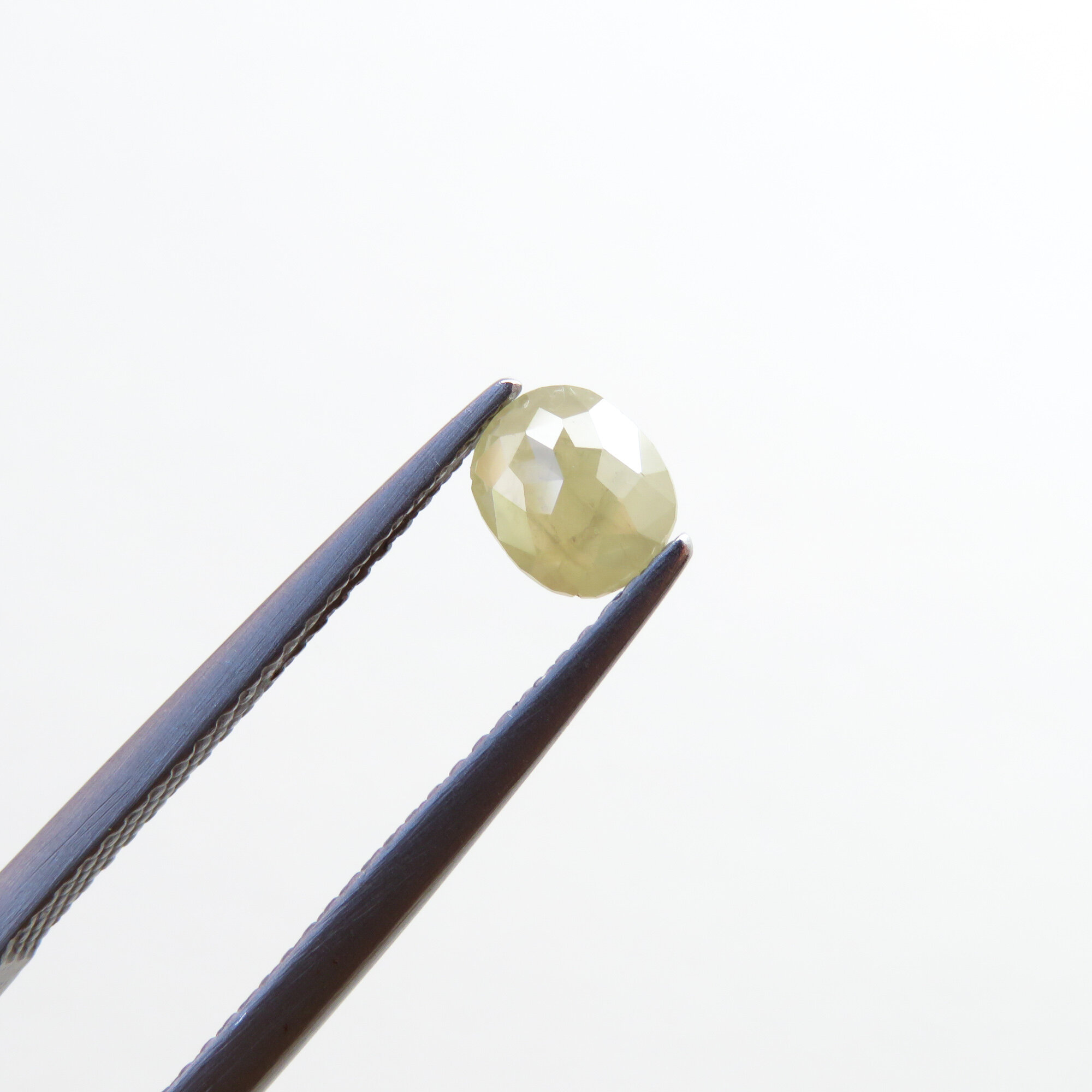 opaque grey yellow oval mixed cut diamond