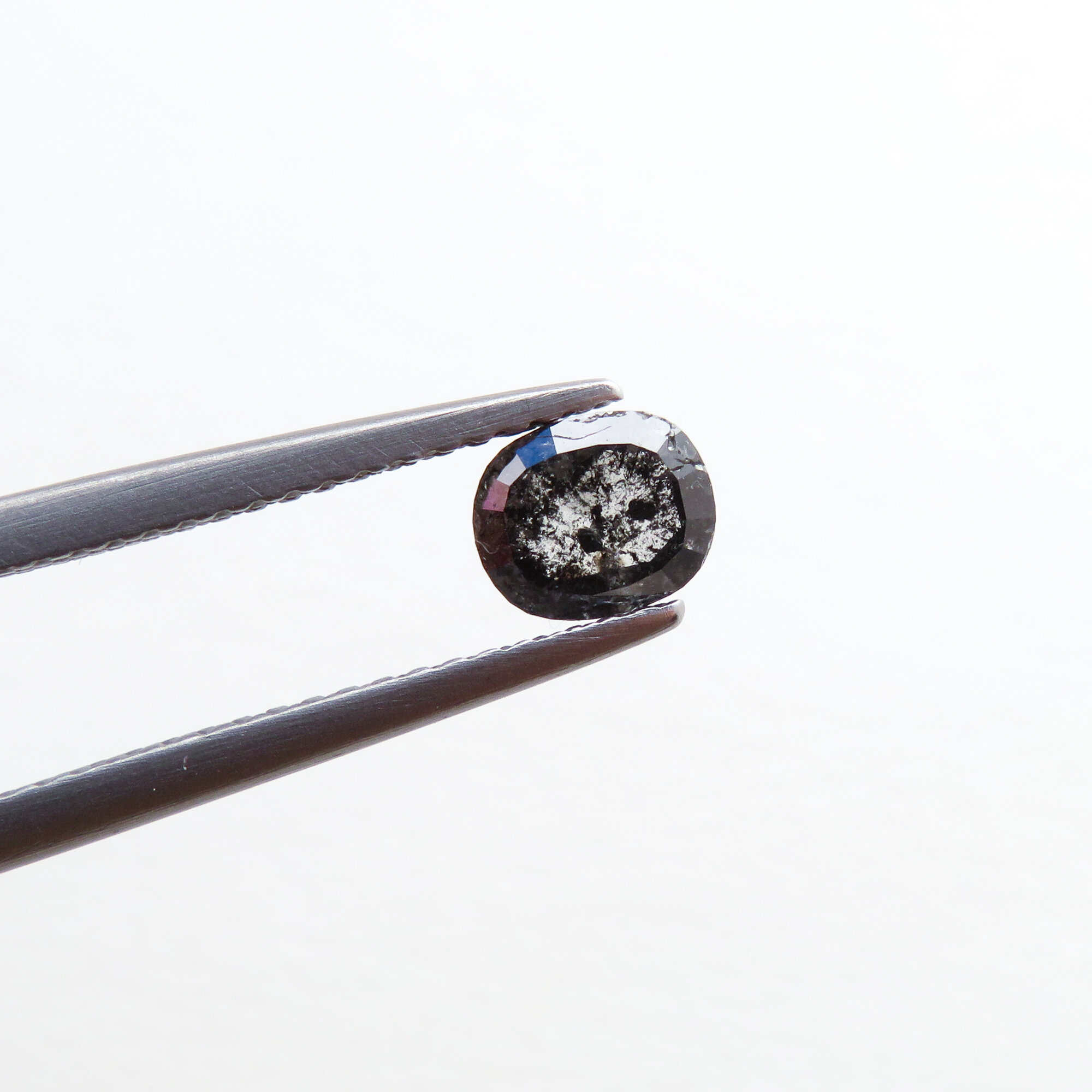 dark grey salt and pepper oval diamond ring settings