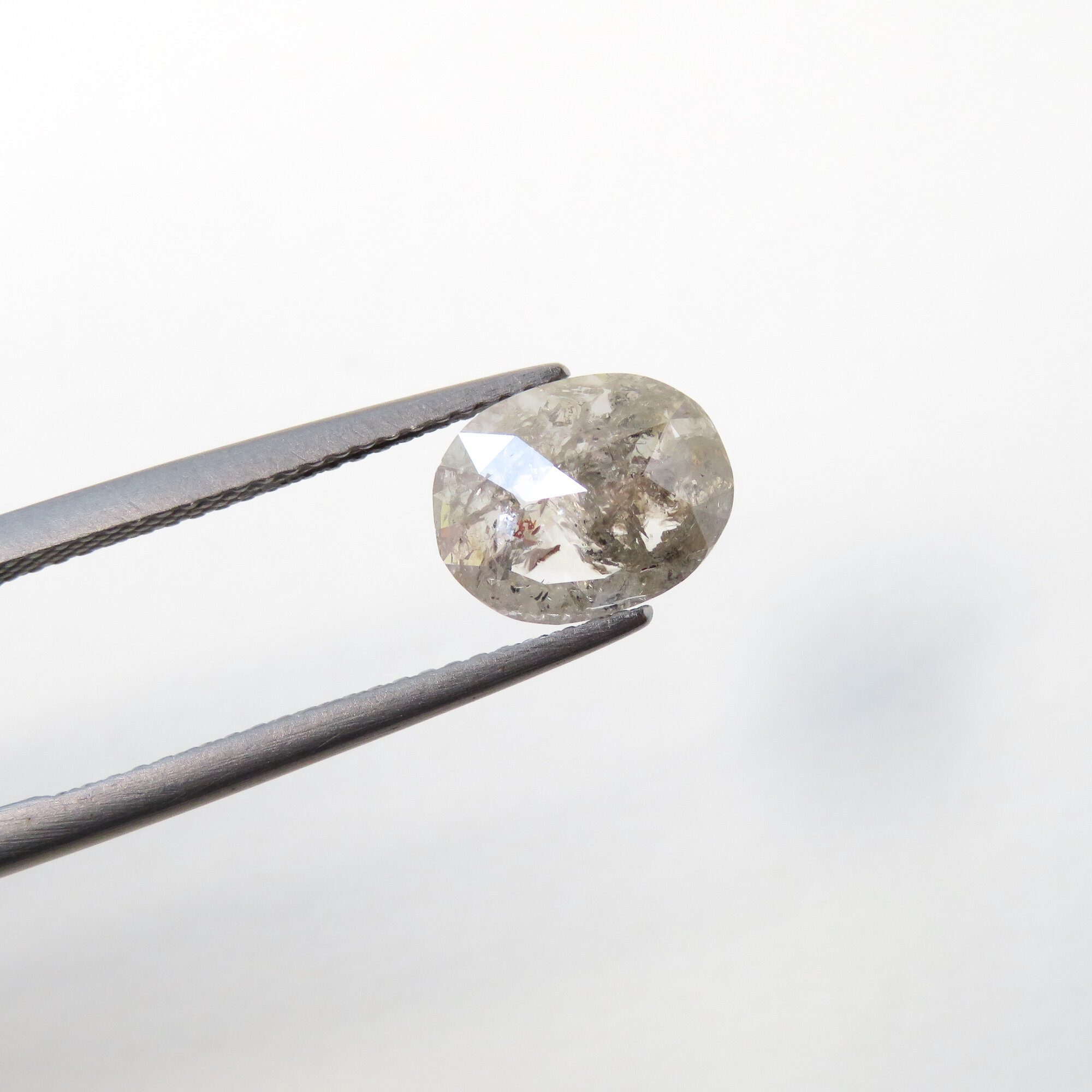 light grey oval rose cut diamond