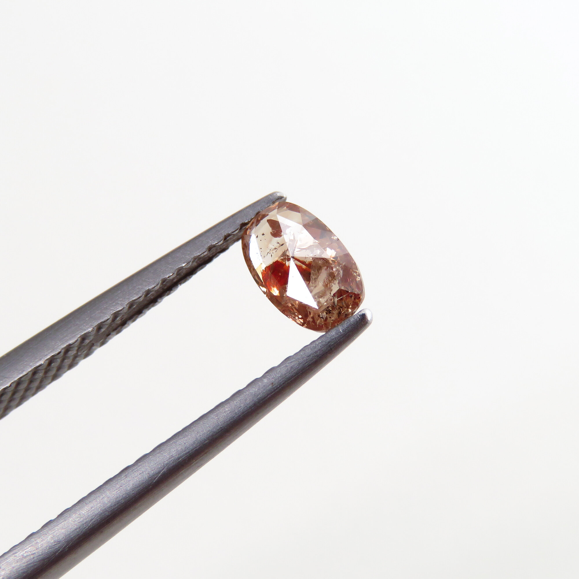 orange brown oval shape diamond