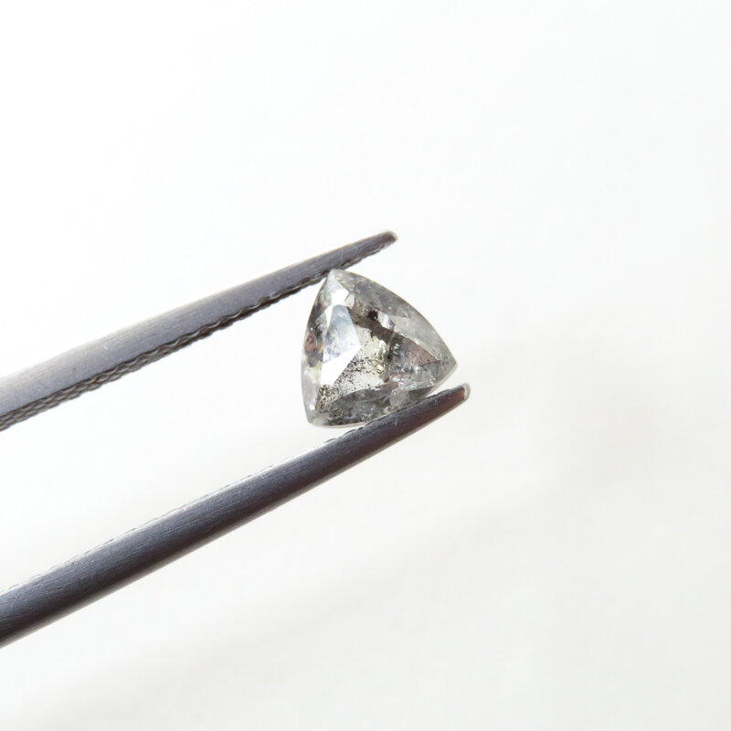 slight blackish yellow trillion diamond shape