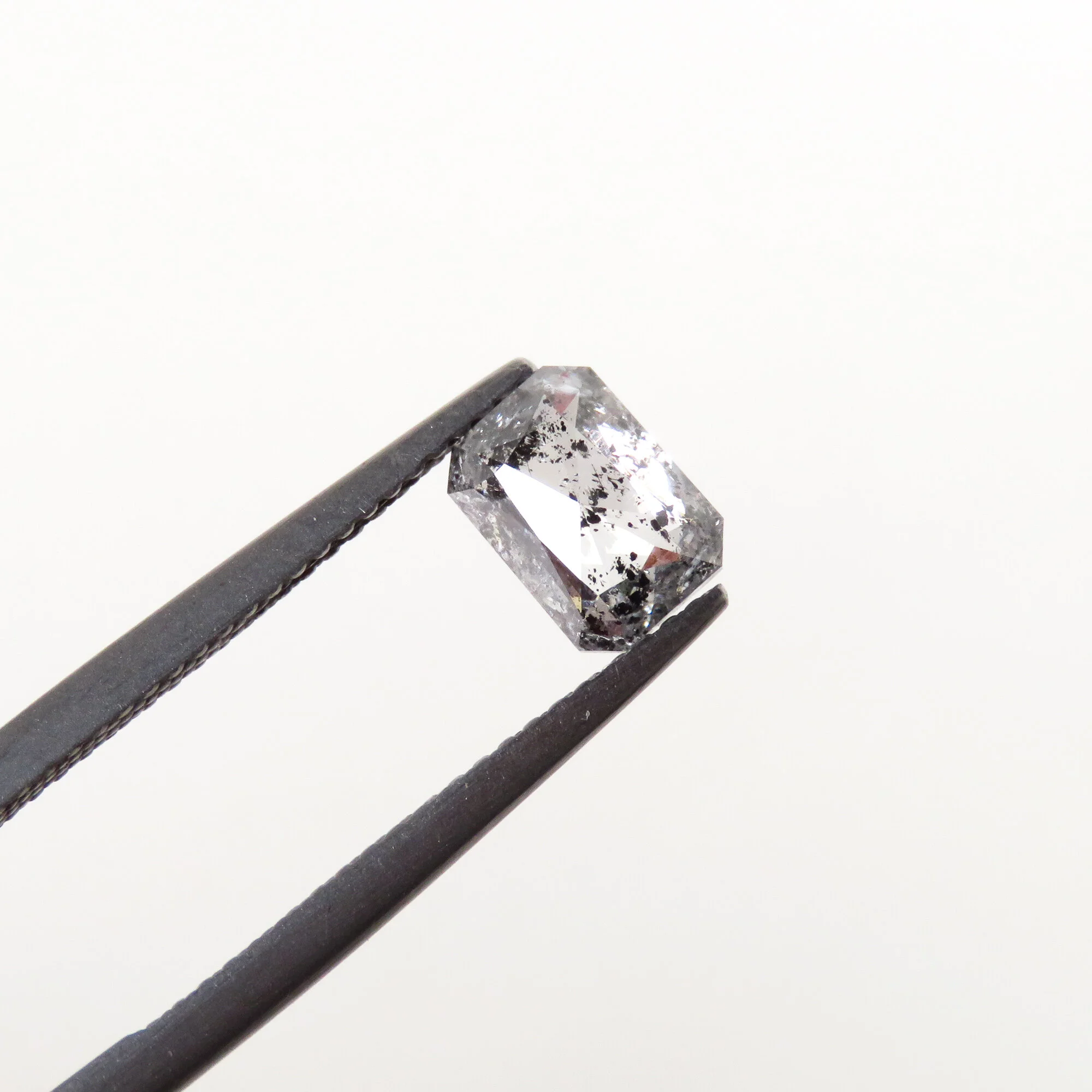 light grey emerald cut diamond