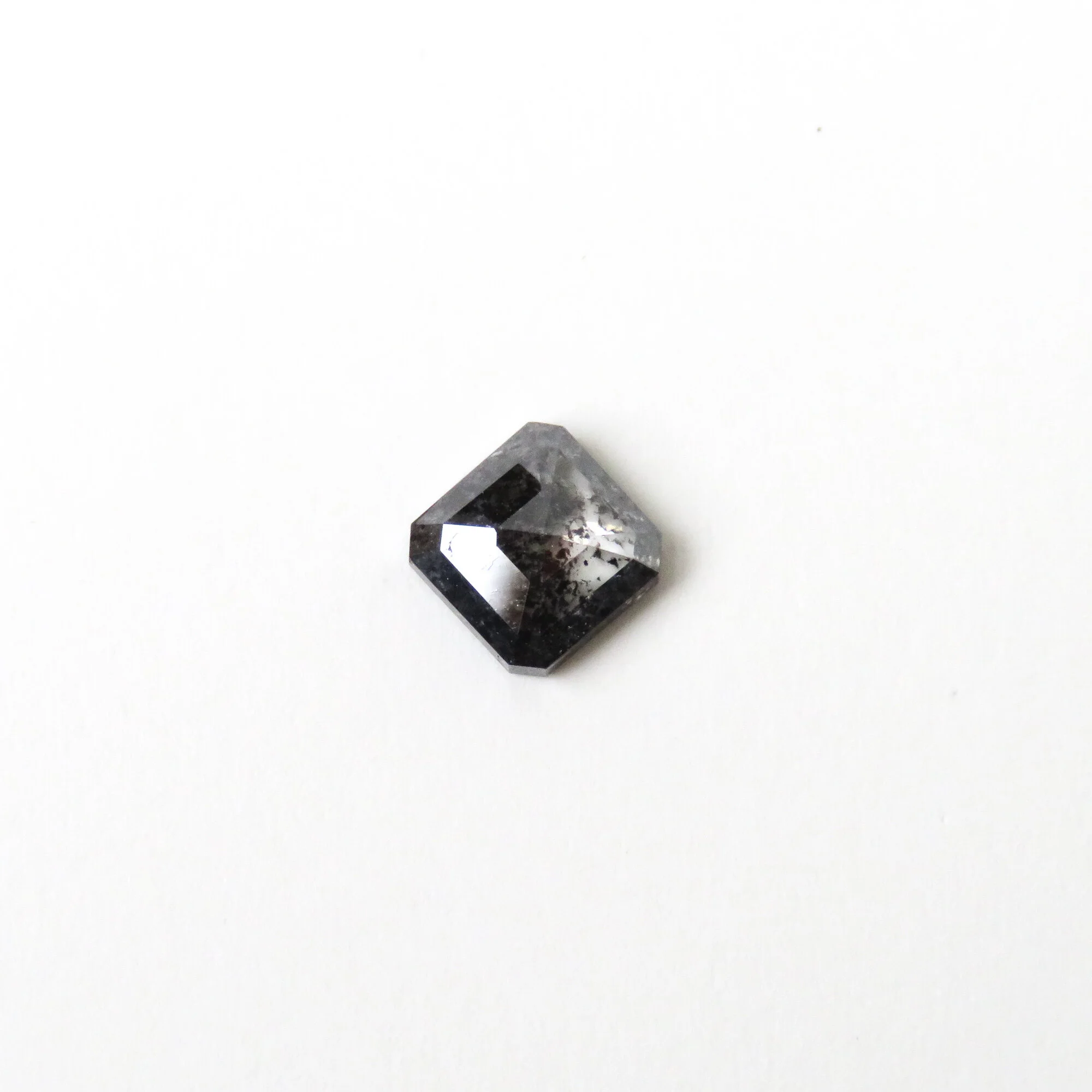 dark grey square emerald cut diamond
