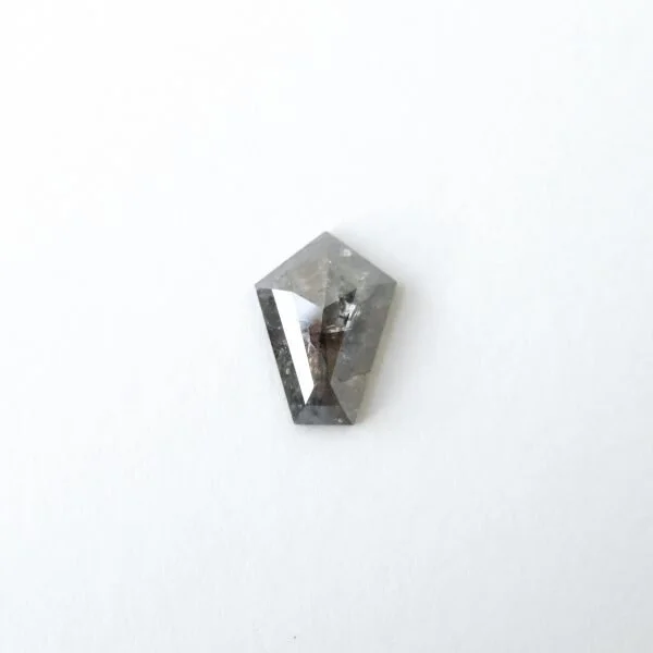 dark grey salt and pepper pentagon shape diamond setting