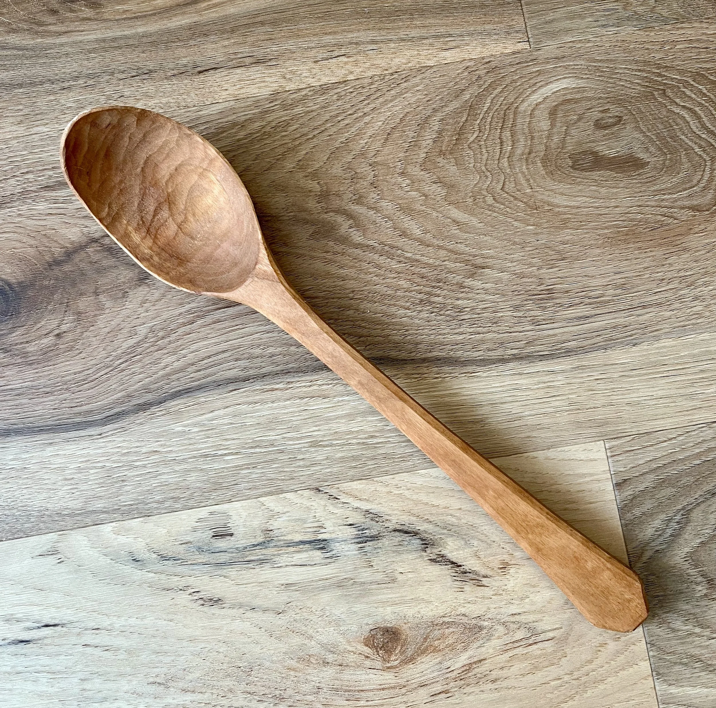 Hand carved wooden spoon donated by Curtis Buchanan