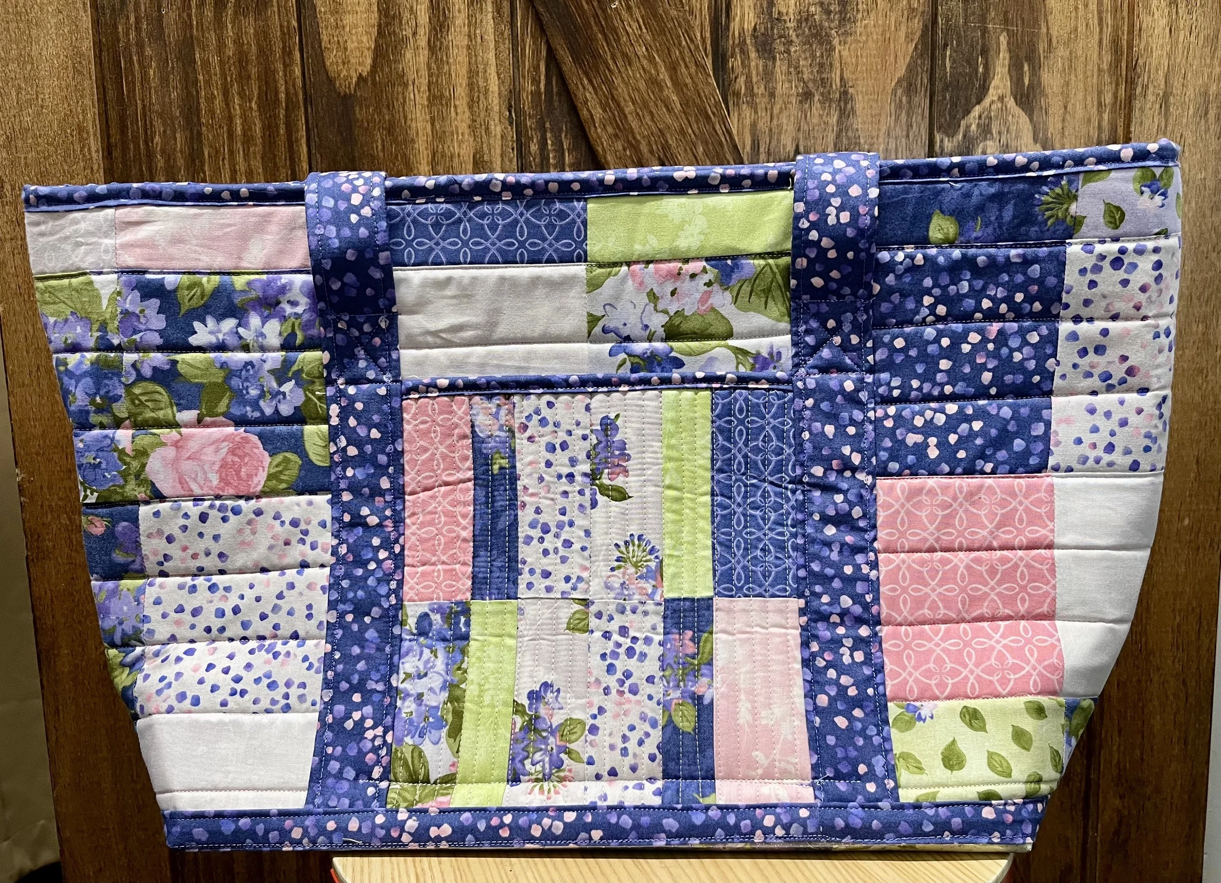 Quilted bag (22" x 13") with handles donated by Tabitha Dotson