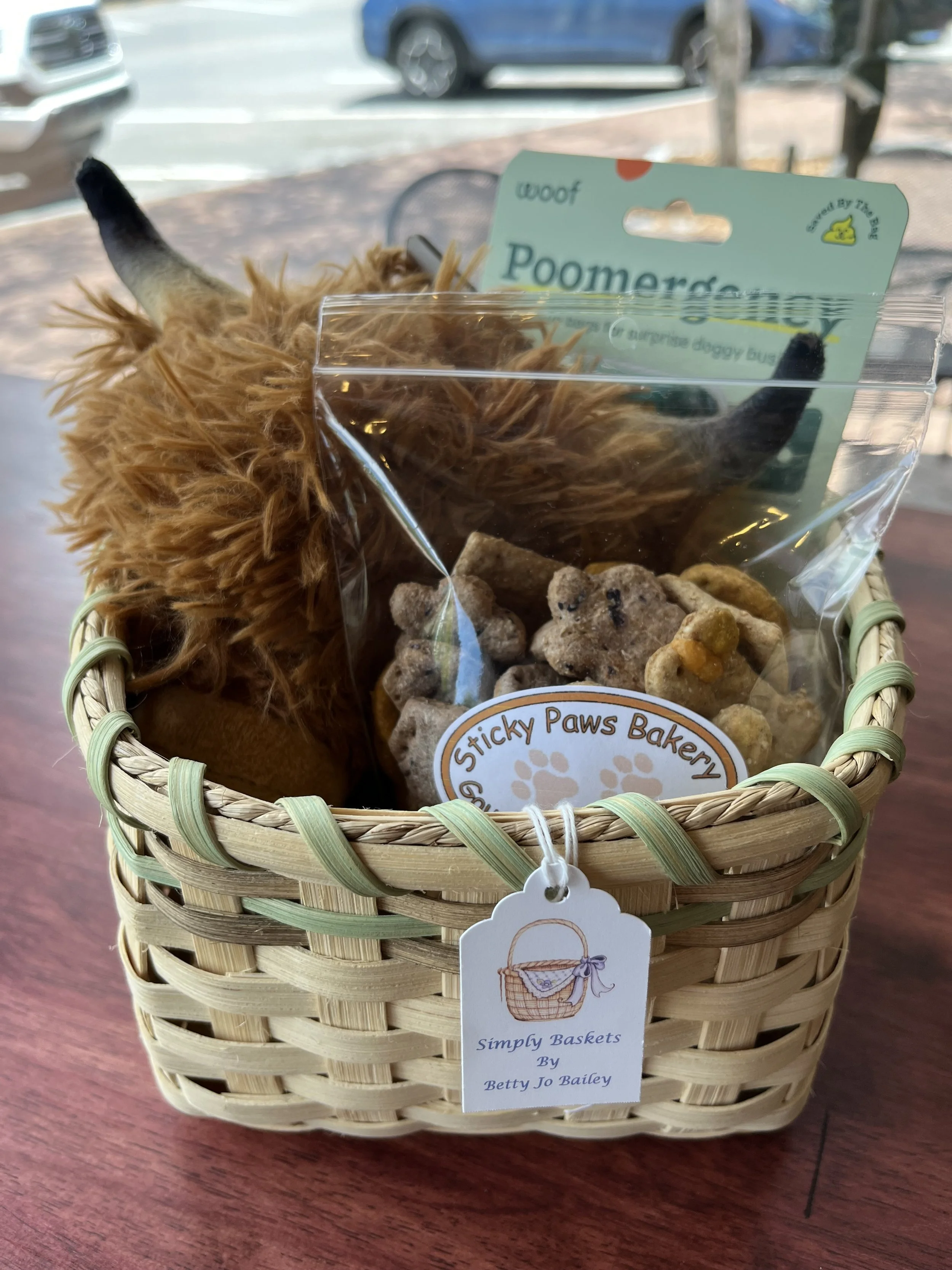 Bark Basket: basket and dog treats donated by Sticky Paws; also includes toy and Poomergency bags