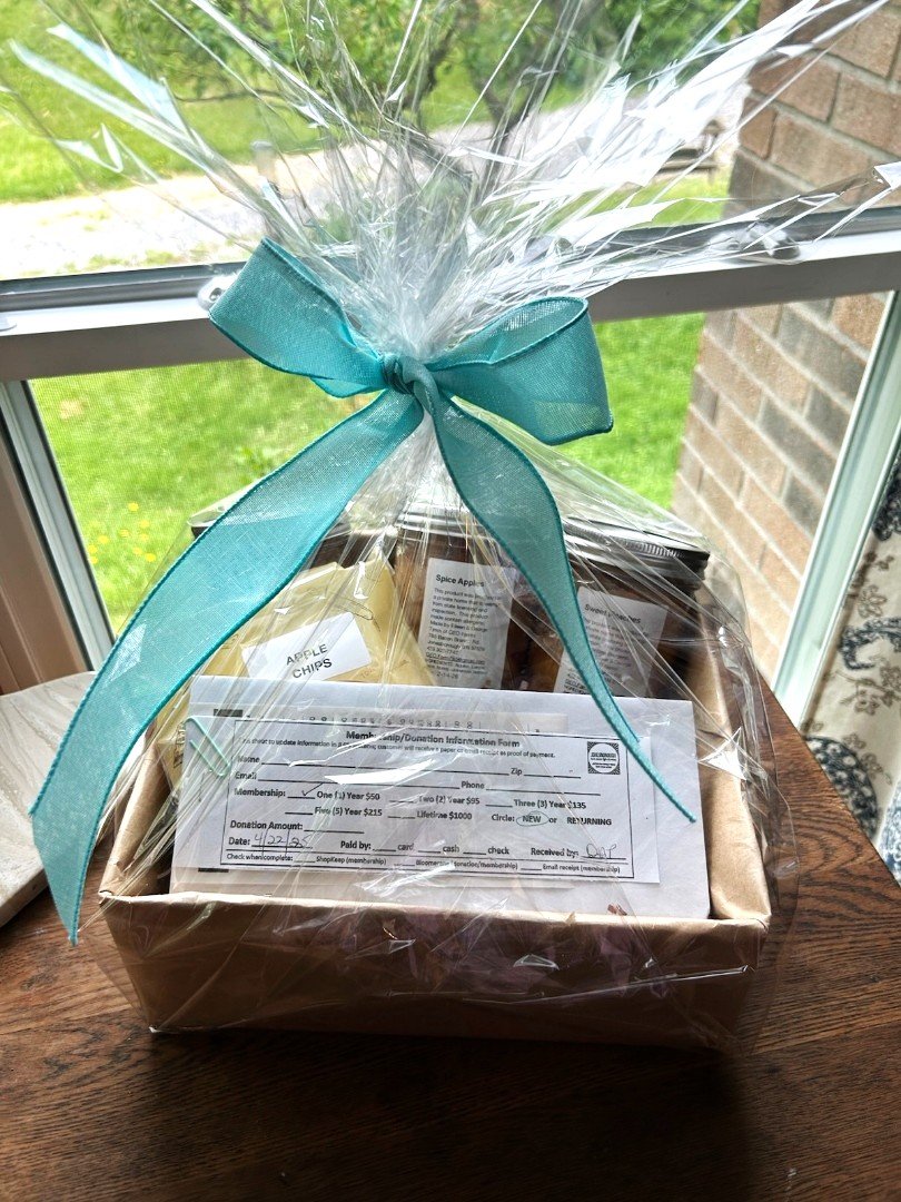 Home-canned goods (peaches, spiced apples, and applesauce, apple chips, and a 1-year Jonesborough Locally Grown membership donated by GEO Farms