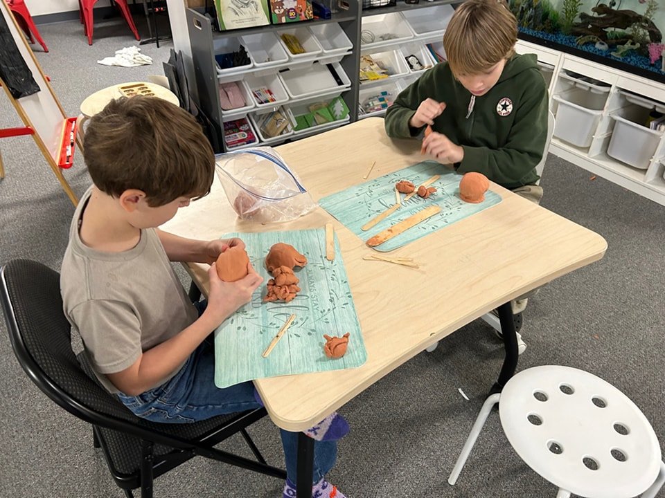 Using the hands to sculpt clay not only encourages creativity, but it helps to strengthen the hands and develops fine and gross motor skills. 

 #beaconacademy #montessori #beaconacademync #learningisfun #learnthroughplay #makelearningfun #motorskill