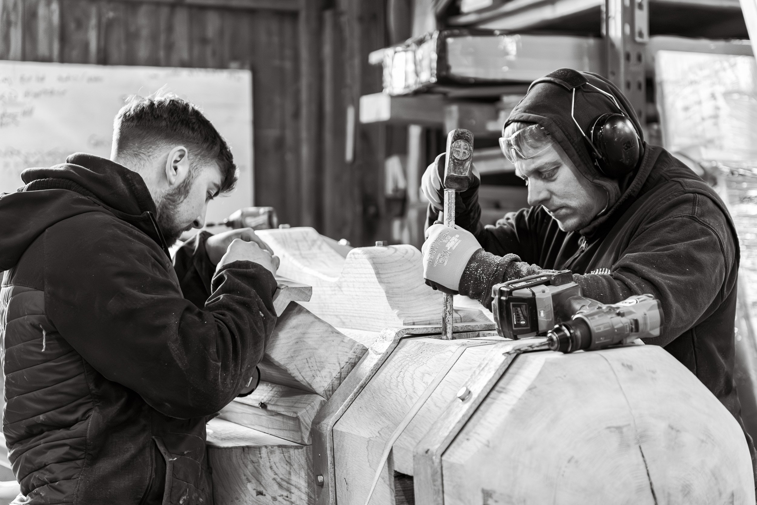 Craftsmen working in the workshop on the timber capstan restoration project Whitby Harbour by J Hallam Joinery.