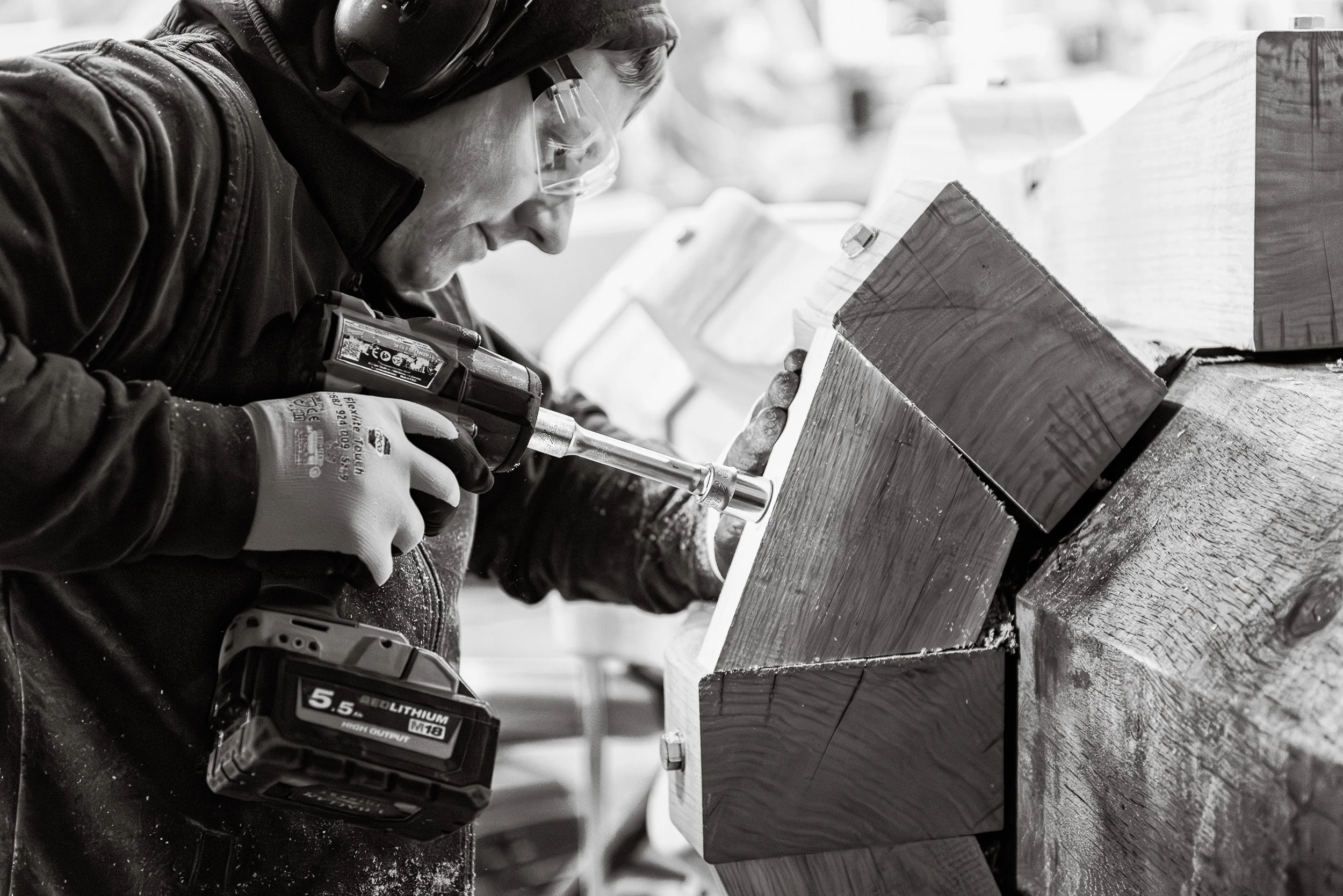 Craftsman working on the timber capstan restoration Whitby Harbour by J Hallam Joinery.