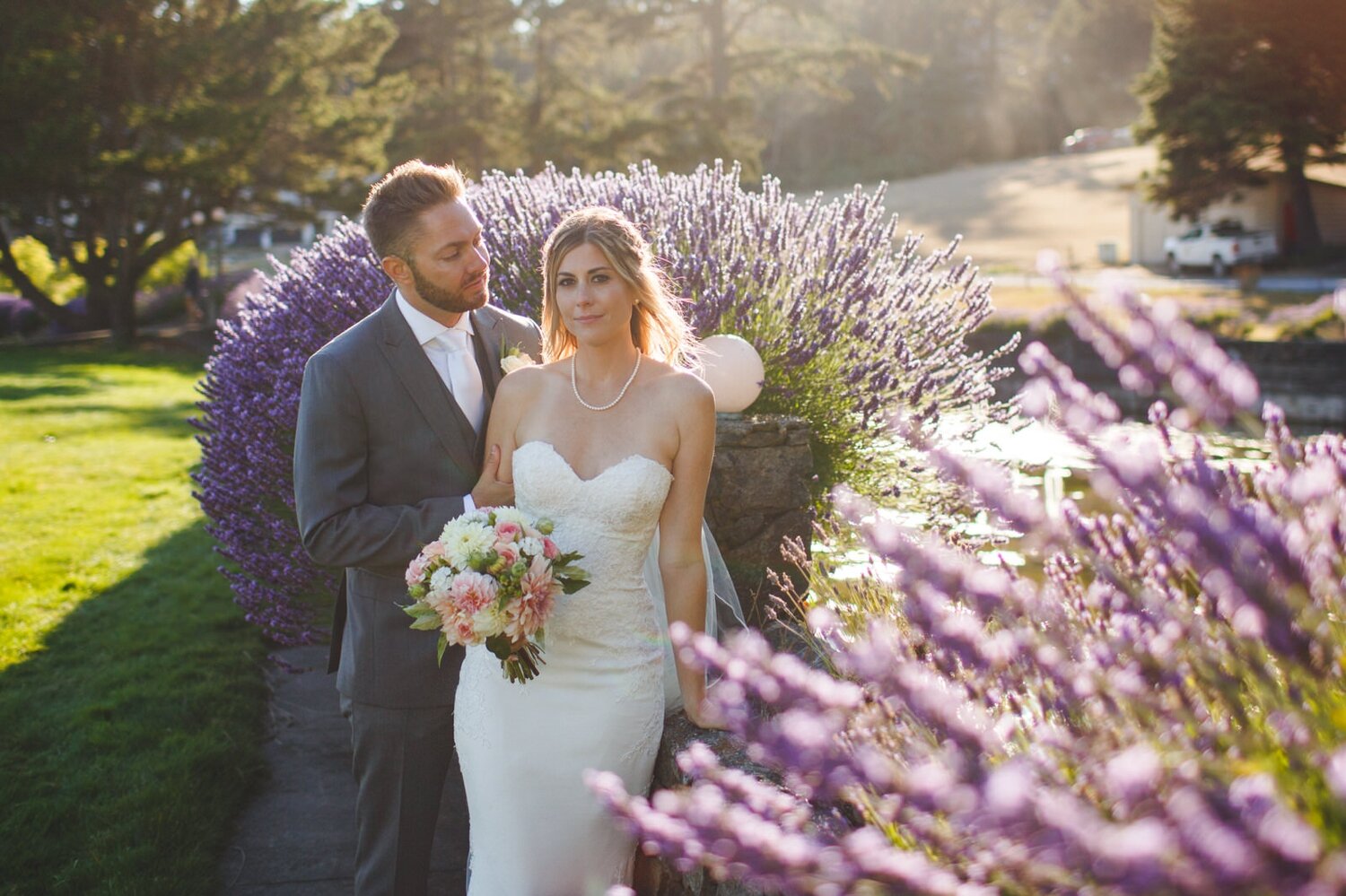 Bride and Groom with Lavender on Wedding day by Satya Curcio Photography