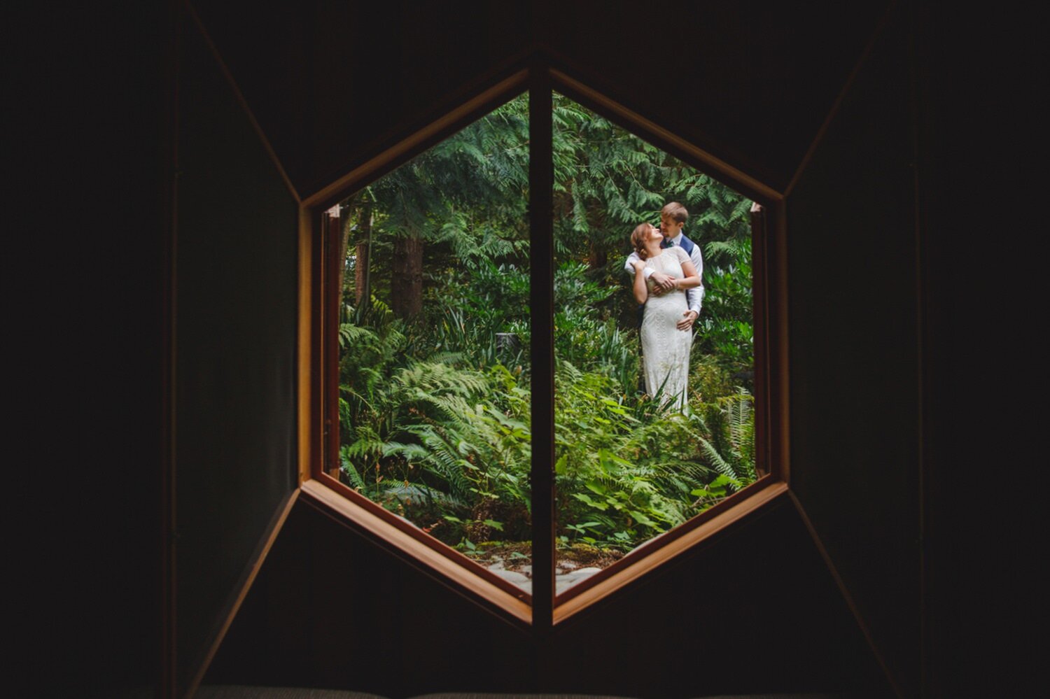  wedding portrait through Art Deco Window 