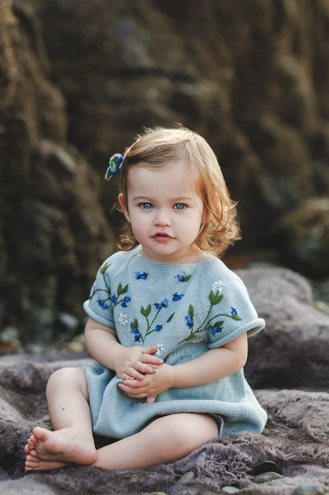 A portrait of a little girl on the beach on Orcas Island - family portrait by Satya Curcio