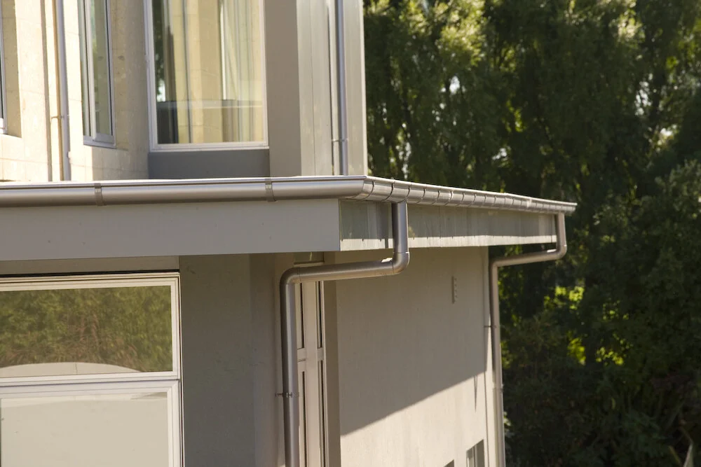 HALO 125 round powder coated aluminium residential spouting with external brackets - continuous group New Zealand 3..jpg