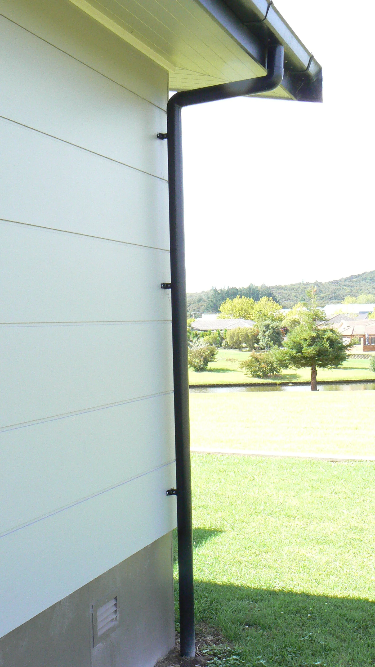 80 mm round powder coated aluminium downpipes - continuous group New Zealand 15..JPG