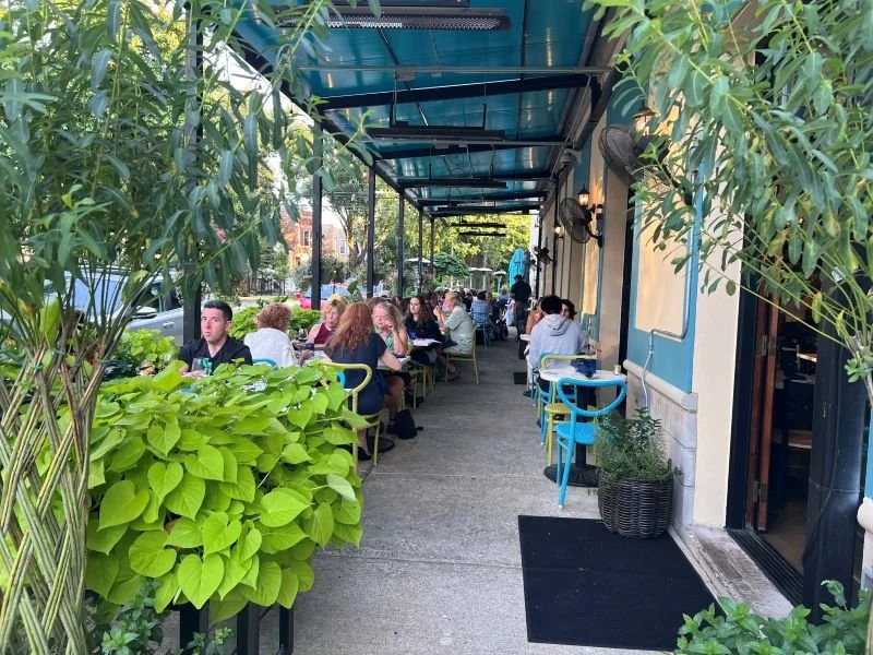 people setting on the patio