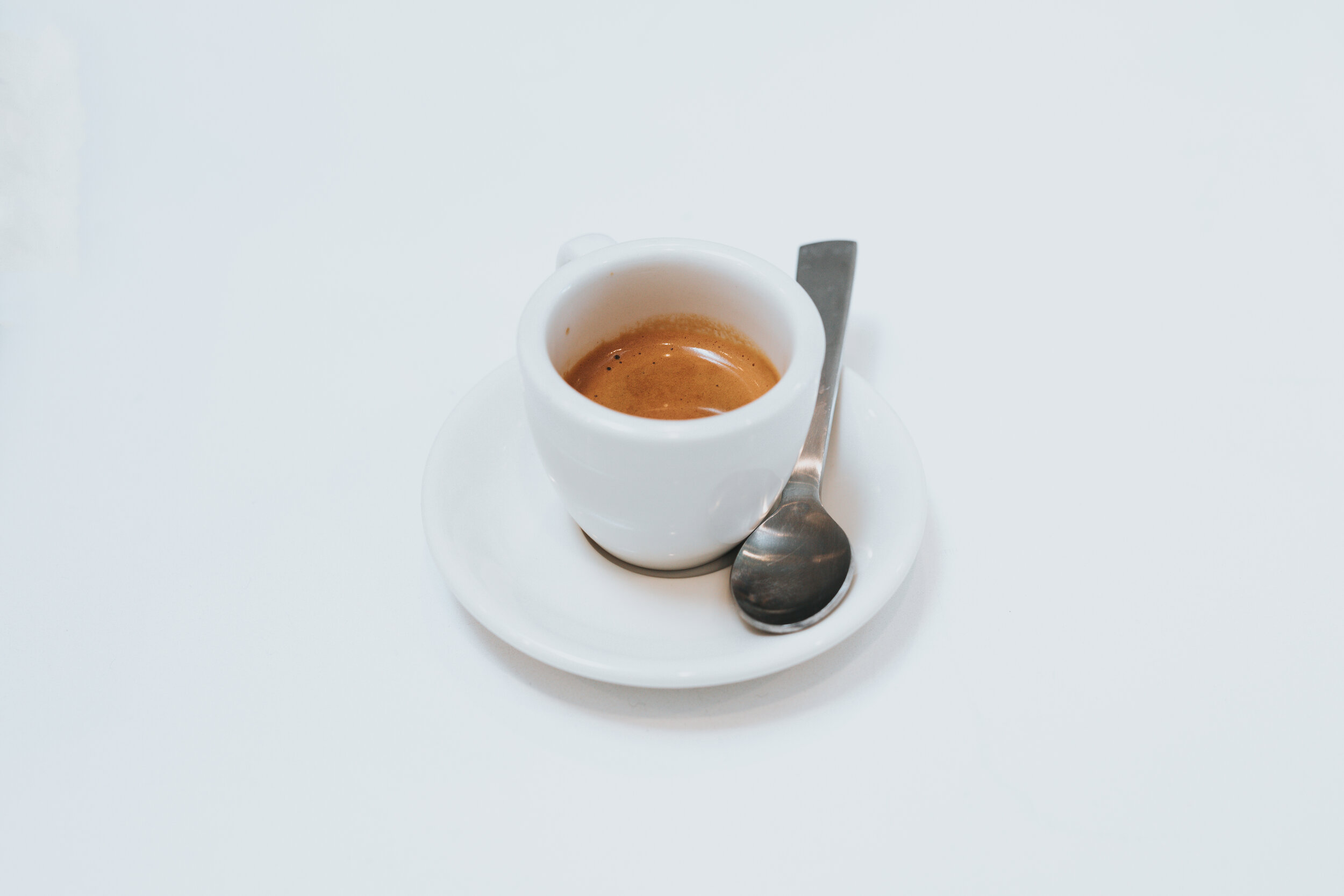 https://images.squarespace-cdn.com/content/v1/5e5586ca1046aa2b89894894/1585401270965-RJ4YRX3ANYLOR70B5DTQ/Picture+of+Espresso+Shot+in+Cup+with+Spoon