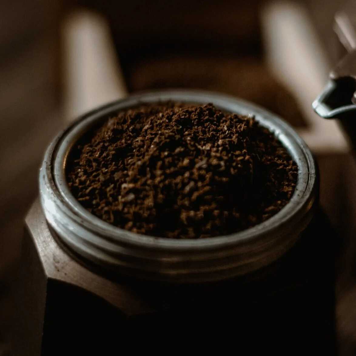 Moka pot filled with ground coffee