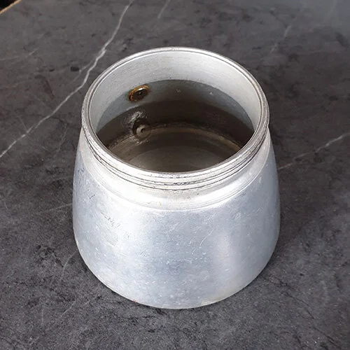 Moka pot filled with water