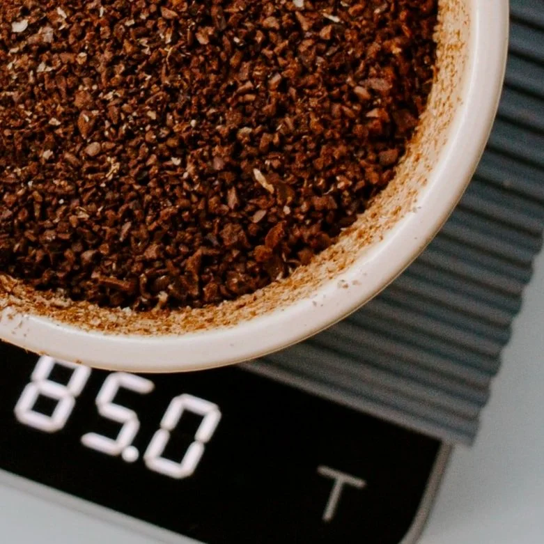 Should You Spray Your Coffee Beans Before Grinding? Home Coffee Tips
