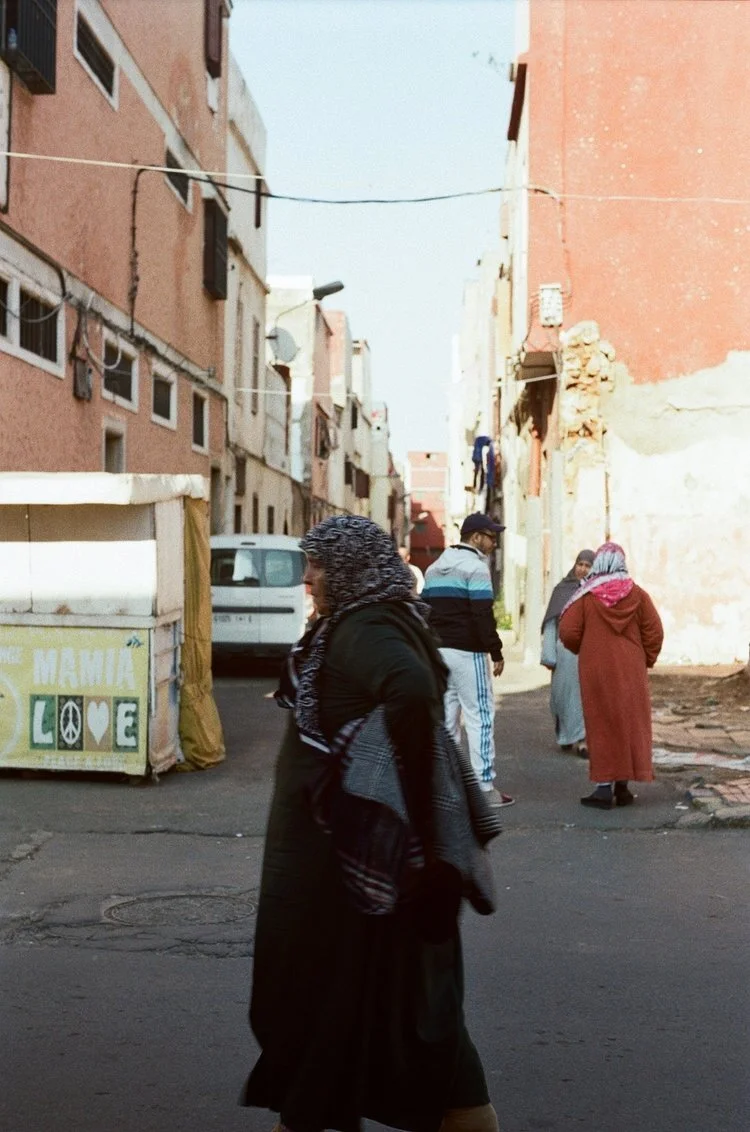 A local woman walks in the Habous quarter