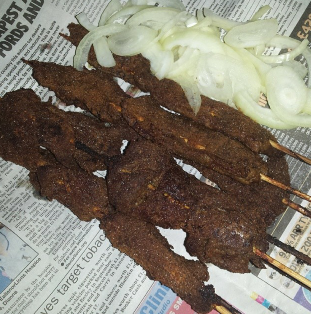 Onions, tsire spice, seasonings and meat are resplendent when they come together. Photo by Honeybee5512, CC BY-SA 4.0, via Wikimedia Commons.