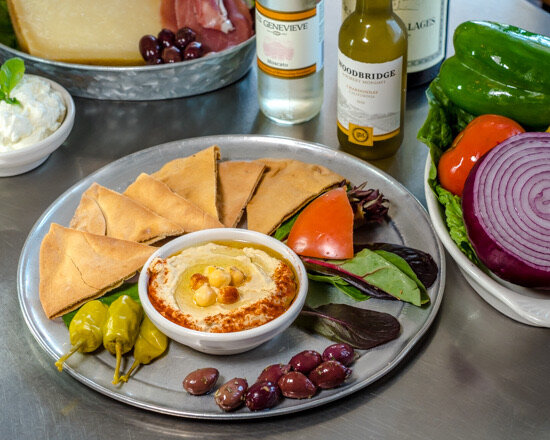Dip into deliciousness with our homemade hummus! Made with creamy chickpeas, tahini, zesty lemon juice, and garlic, this Mediterranean classic is perfect for snacking with pita crisps or soft pita bread. 😋🥙

Order online or visit is in one of our t