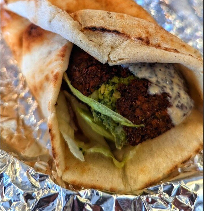 In addition to delicious pizzas, did you know that we also make Greek gyros? Our mouthwatering gyros are packed with 🥩juicy strips of beef, 🥒zesty tzatziki sauce, 🍅ripe tomatoes, and 🧅crispy onions, all nestled inside a 🥙warm pita wrap. It's the