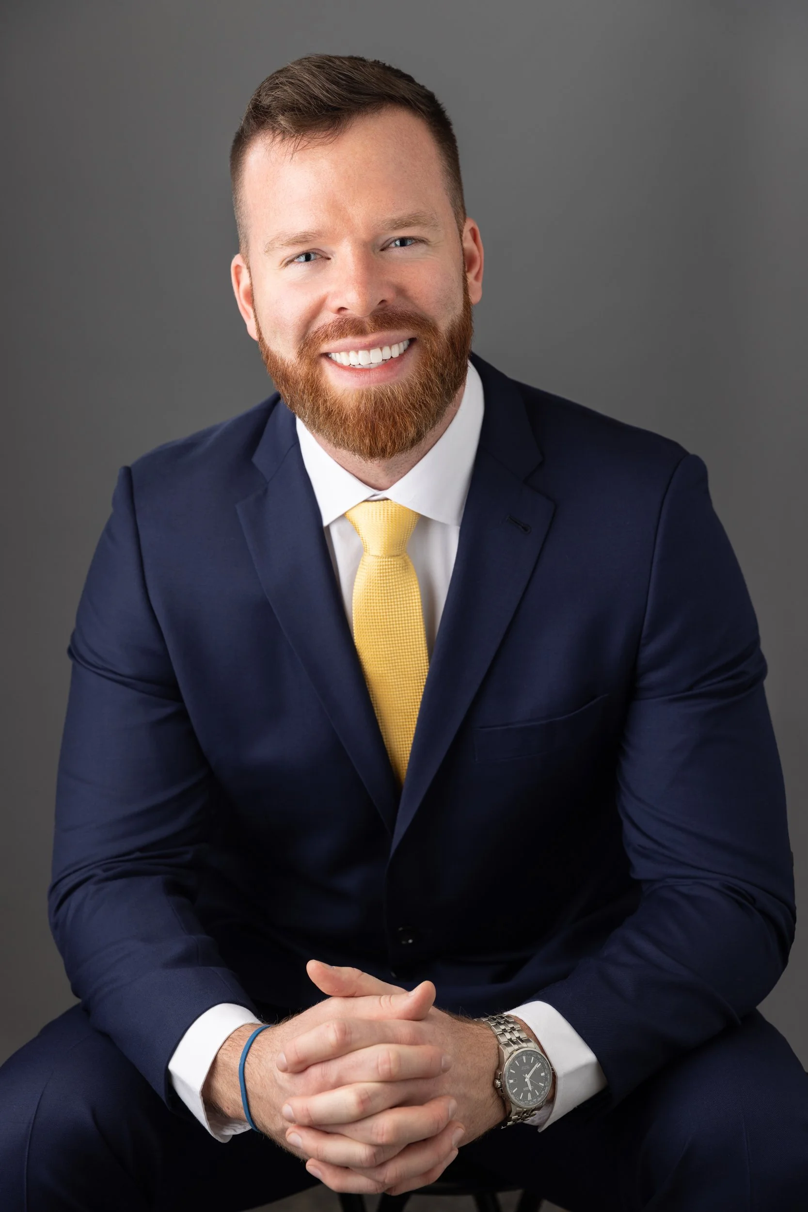 Confident headshot for busy executive