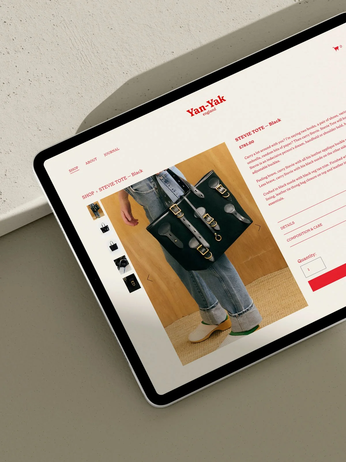 Yan-Yak leather goods website seen on an iPad featuring the Stevie tote bag in black.