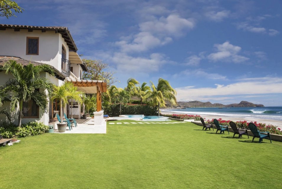 Casa_Colorados_Revised_2022_Wide_Shot_House_Yard_Pool_Ocean_View-955x640.jpeg