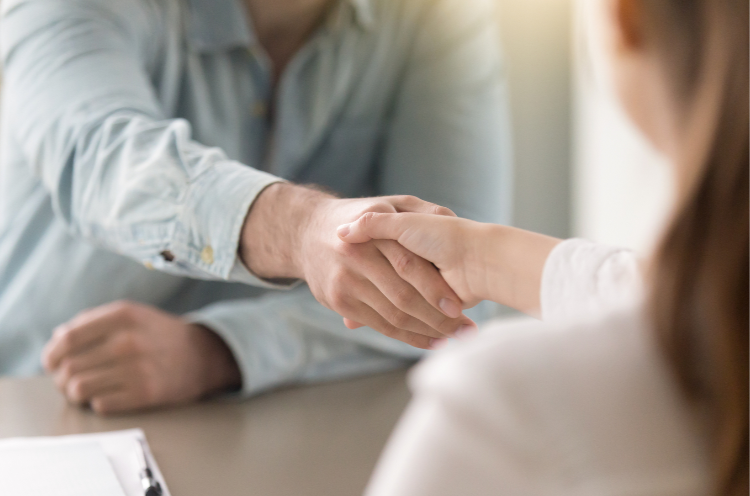 man and woman hand shake.PNG