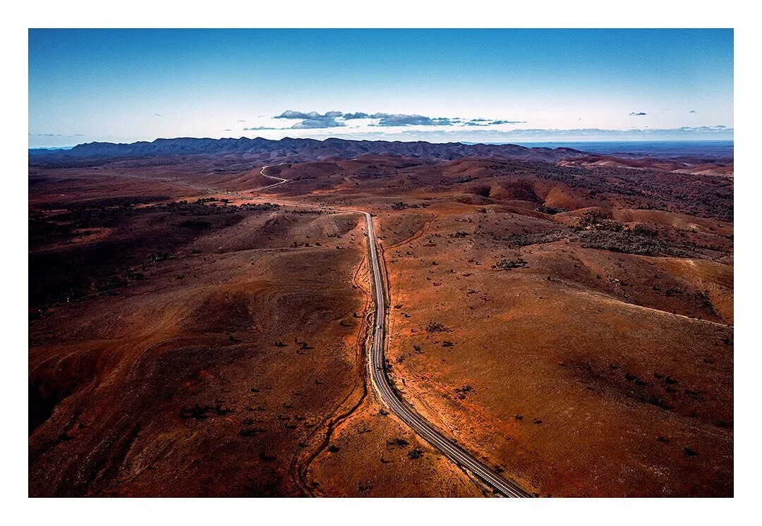 Driving into the Flinders Ranges, SA. ⁣
⁣
This is the east side of the ranges so you can see St Mary&rsquo;s Peak in the middle which guards the entrance to Ikara (Wilpena Pound) and Moonarie is way over on the left. ⁣
⁣
Being the largest mountain ra