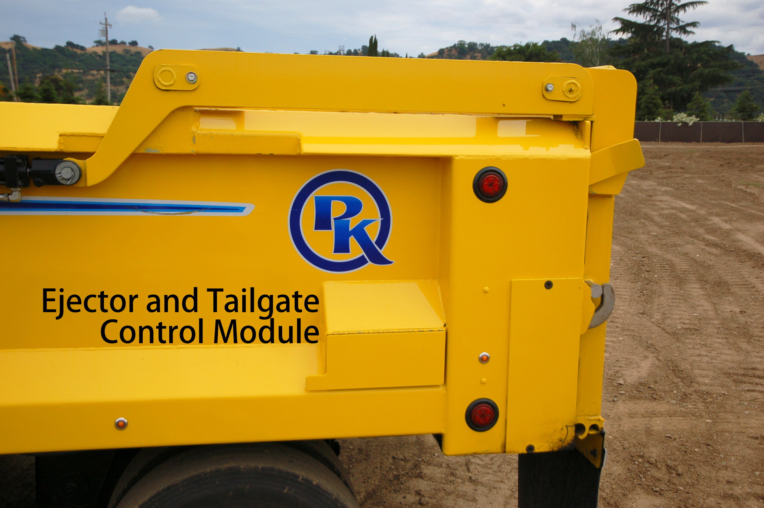 If the remote control is lost or damaged, redundant hard wired controls for the ejector system are located at the rear, street side, optional curb side for dual controls available.