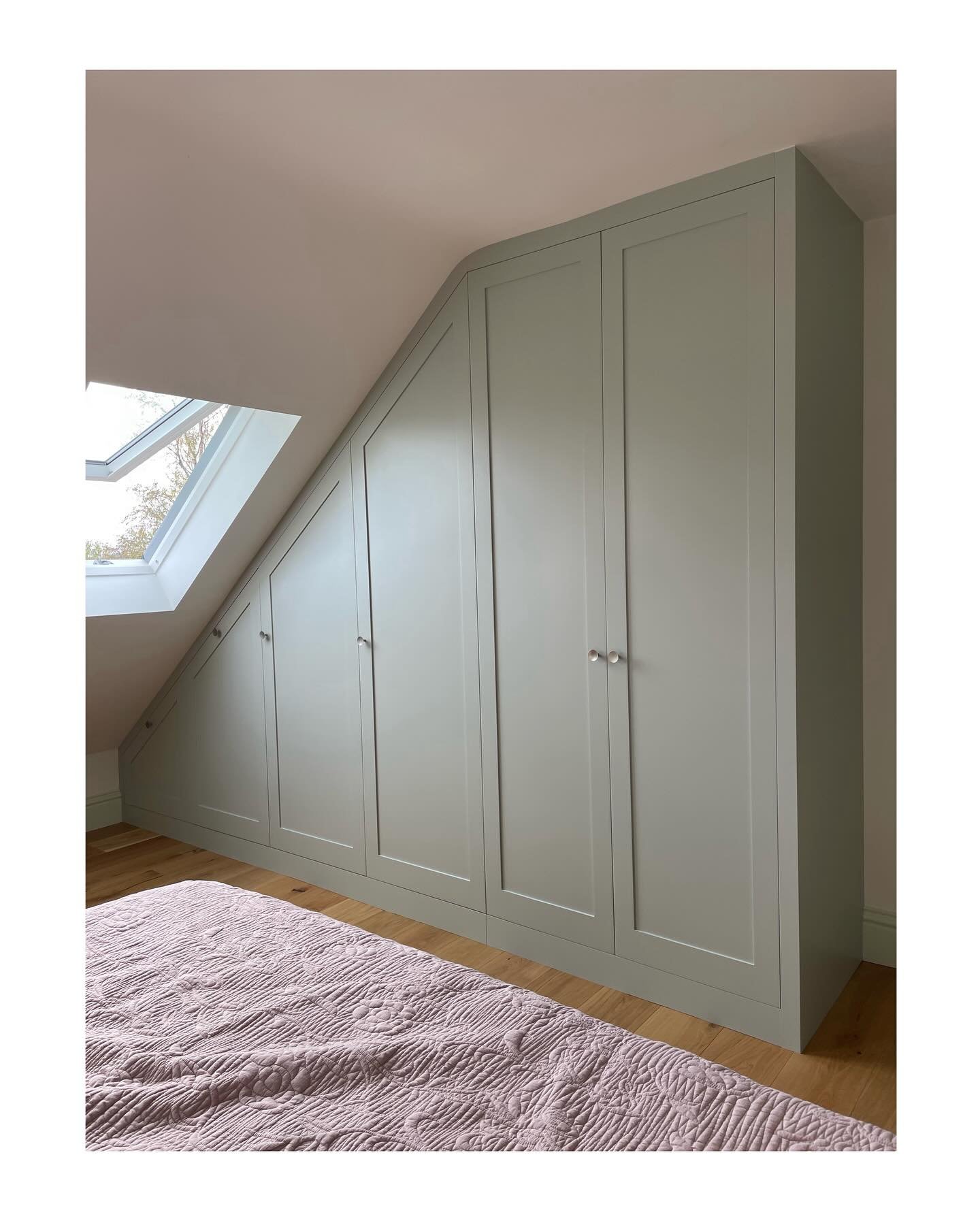 W A R D R O B E

Freshly fitted shaker style wardrobe with a spray painted exterior and an oak interior. 
The brief was to make use of the dead space in the corner of the room, so I decided to make pull out shoe racks in the lower two sections of the