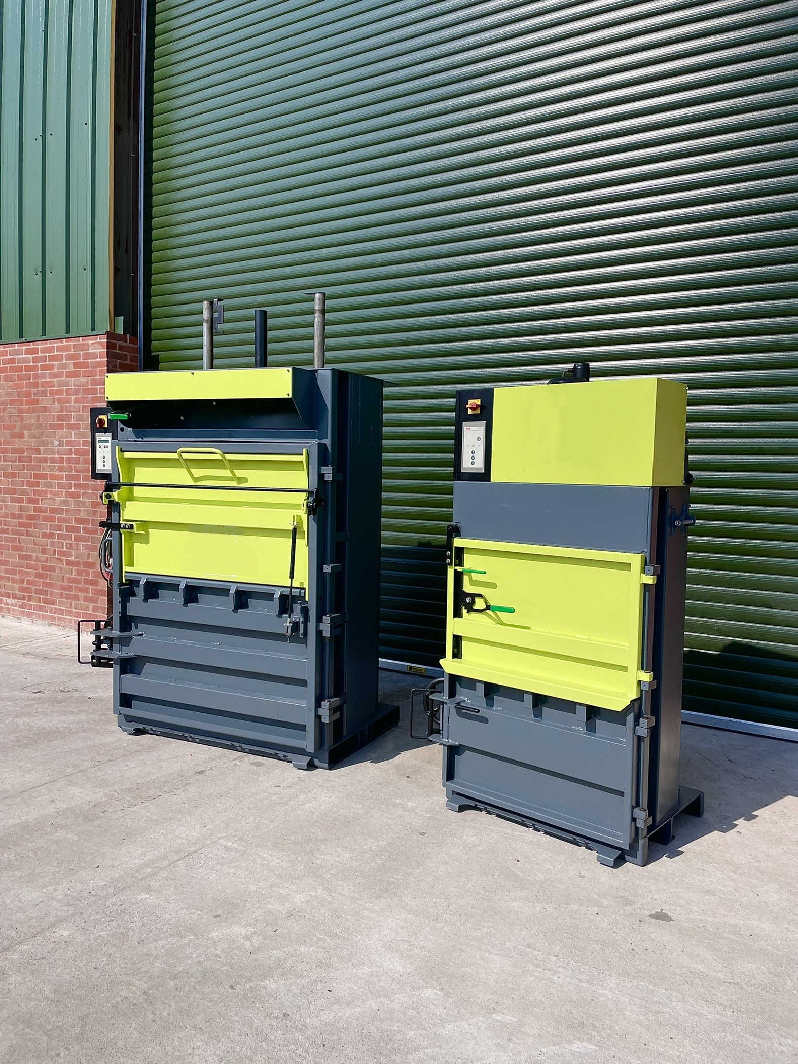 A pair of baling machines