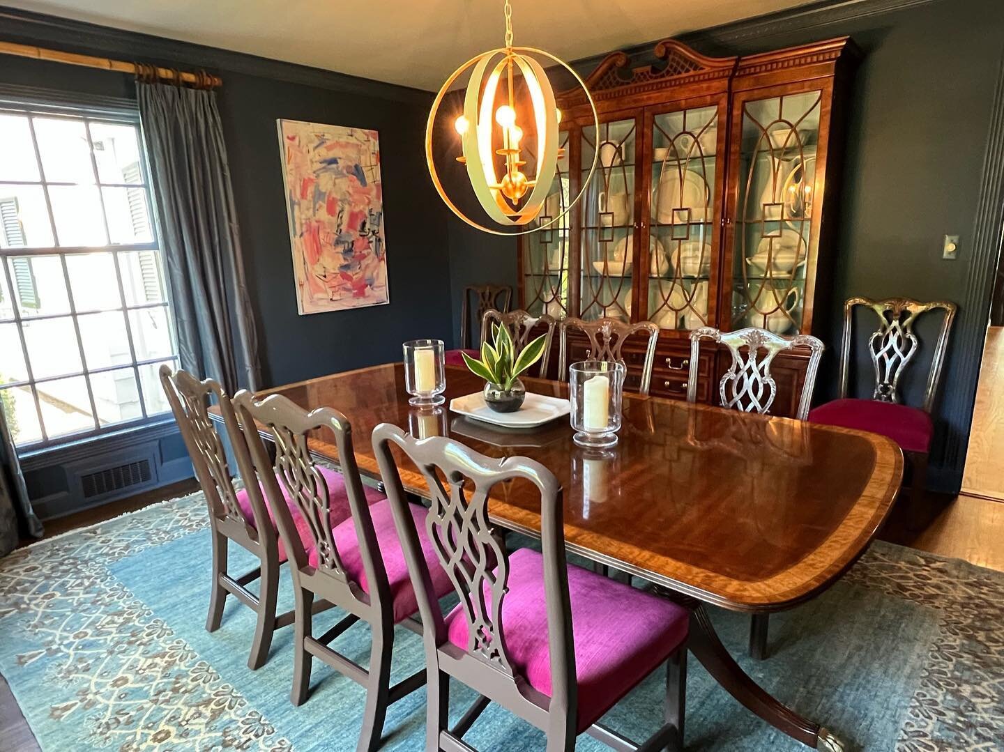 We love this client&rsquo;s use of color! Henredon Dining Room Set. 
Double Pedestal Table, 3 leaves and pads &amp; 8 Chairs. Table is 45w x 68l x 29h without leaf, each leaf add 22. 
Painted Chairs with Magenta Upholstered Seats. Table $1375
Chairs 