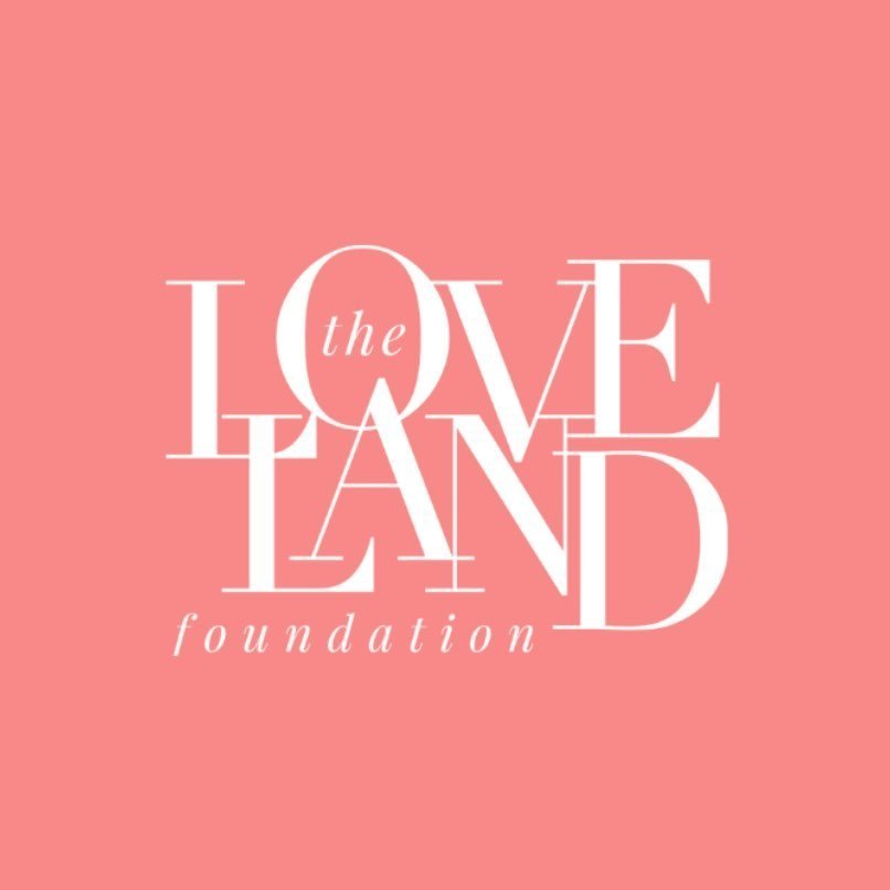 Pink background with white text that says "the LOVE LAND foundation" in a stylized font.