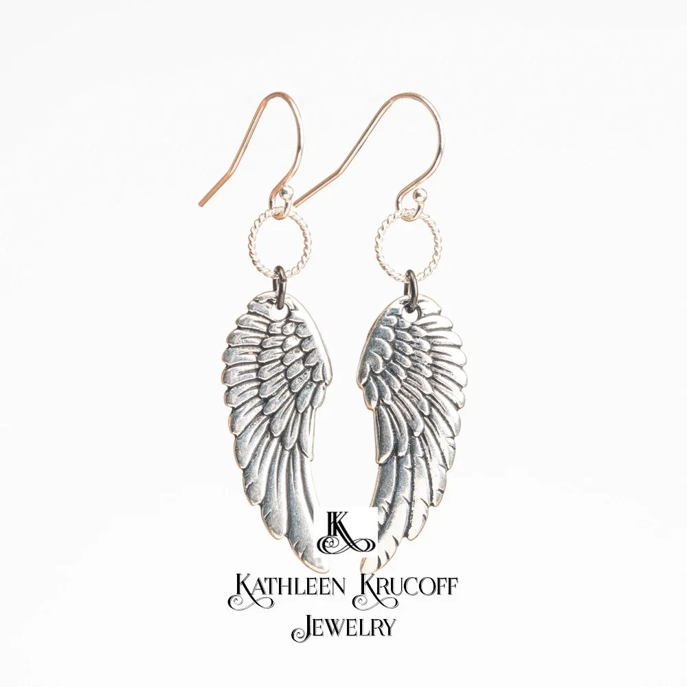 Wing Earrings Branding.jpg