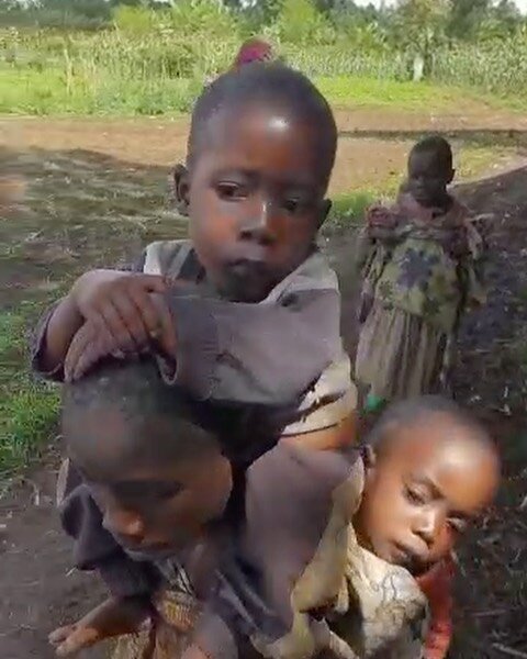 Heartbreaking to witness. 9 year old, Sifa, carrying her two younger brothers, Riphin (5yo) and Freddy (4yo) because they are too weak from malnutrition to even walk. Thankful for our team who found these children and took immediate action to get the